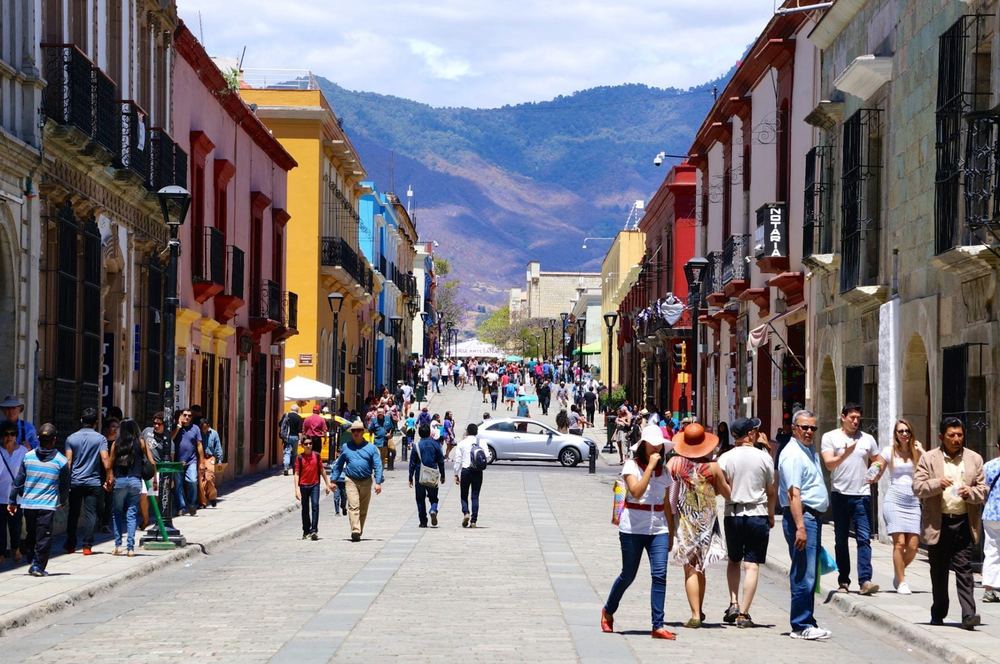 People walking along a street in central Oaxaca